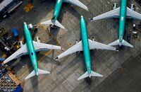 An aerial photo shows Boeing 737 Max airplanes parked on the tarmac at a factory in Renton, Wash., on March 21, 2019.
