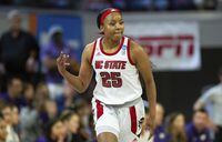 North Carolina State's Kayla Jones (25) reacts after a three-pointer during the first half of a college basketball game against Kansas State in the second round of the NCAA tournament in Raleigh, N.C., Monday, March 21, 2022. (AP Photo/Ben McKeown)