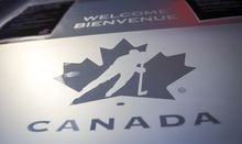A Hockey Canada logo is seen on the door to the organizations head office in Calgary, Alta., Sunday, Nov. 6, 2022. The Canadian government has restored funding to Hockey Canada. THE CANADIAN PRESS/Jeff McIntosh