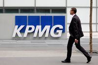 The logo of KPMG, a professional service company, is seen at the company's head offices at La Defense business and financial district in Courbevoie near Paris, France. May 16, 2018.  REUTERS/Charles Platiau