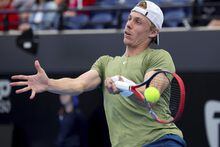 Canada's Denis Shapovalov makes a forehand return to Russia's Roman Safiullin during their Round of 16 match at the Adelaide International Tennis tournament in Adelaide, Australia, Thursday, Jan. 5, 2023. (AP Photo/Kelly Barnes)