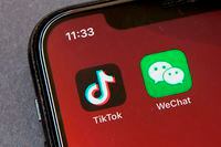 FILE - A federal judge has approved a request from a group of WeChat users to delay looming U.S. government restrictions that could effectively make the popular app nearly impossible to use. In a ruling dated Saturday, Sept. 19, 2020, Magistrate Judge Laurel Beeler in California said the government’s actions would affect users’ First Amendment rights as an effective ban on the app removes their platform for communication. (AP Photo/Mark Schiefelbein, File)