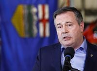 Jason Kenney speaks in Calgary, Friday, March 25, 2022. The Alberta premier, buffeted by party infighting and a contentious leadership review, is rejecting speculation he may call an early election as part of a last-ditch effort to maintain control. THE CANADIAN PRESS/Jeff McIntosh