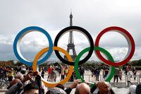 FILE PHOTO: Olympic rings to celebrate the IOC official announcement that Paris won the 2024 Olympic bid are seen in front of the Eiffel Tower at the Trocadero square in Paris, France, September 16, 2017. REUTERS/Benoit Tessier/File Photo/File Photo/File Photo