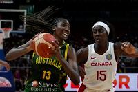 Australia's Ezi Magbegor attempts a shot at goal as Canada's Laeticia Amihere attempts to block during their game at the women's Basketball World Cup in Sydney, Australia, Monday, Sept. 26, 2022. (AP Photo/Mark Baker)