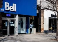 After a provincial order to shut all non-essential businesses in Ontario, a normally bustling Queen Street West is lined with closed stores and empty of shoppers in Toronto Wednesday afternoon. One Bell store and a pet store remained open on the stretch.March 25, 2020(Melissa Tait / The Globe and Mail)