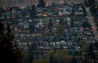 Houses are seen on a hillside in Burnaby, B.C., on Saturday, April 17, 2021. The Real Estate Board of Greater Vancouver says September's homes sales dropped by 46 per cent since last year and 10 per cent from August as the number of buyers in the market fell. THE CANADIAN PRESS/Darryl Dyck