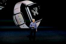 File - Apple CEO Tim Cook discusses the Apple Watch at the Apple event at the Bill Graham Civic Auditorium in San Francisco, Wednesday, Sept. 9, 2015. If Apple unveils a widely anticipated headset equipped with mixed reality technology on Monday, it will be the company's biggest new product since the introduction of the Apple Watch nearly a decade ago. (AP Photo/Eric Risberg, File)