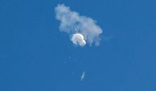 FILE PHOTO: The suspected Chinese spy balloon drifts to the ocean after being shot down off the coast in Surfside Beach, South Carolina, U.S. February 4, 2023.  REUTERS/Randall Hill