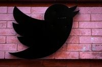 FILE PHOTO: The Twitter logo is seen outside the offices in New York City, U.S., November 9, 2022. REUTERS/Brendan McDermid//File Photo