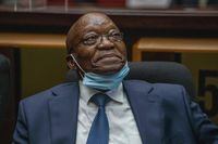 (FILES) Former South African President Jacob Zuma sits in the High Court in Pietermaritzburg, South Africa, on January 31, 2022. South Africa's former president Jacob Zuma reported back to jail on August 11, 2023 only to be swiftly released, the government said in the latest twist in the judicial saga over his contempt of court sentence.
Zuma was ordered to report back to prison and arrived at 6am local time at a detention facility in Estcourt, northwest of Durban, where was "admitted into the system", the prison service said. 
But he was let go almost immediately as part of a "remission process" aiming to address overcrowding in prison, Correctional Services national commissioner Makgothi Thobakgale told a press conference in Pretoria. (Photo by Jerome Delay / POOL / AFP) (Photo by JEROME DELAY/POOL/AFP via Getty Images)