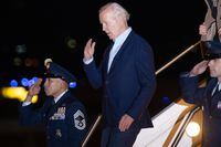 US President Joe Biden salutes while disembarking Air Force One at Henry E. Rohlsen Airport in Christiansted, St. Croix, US Virgin Islands, on December 27, 2022. - The President and First Lady are traveling to the US Virgin Islands to celebrate the New Year with family. (Photo by SAUL LOEB / AFP) (Photo by SAUL LOEB/AFP via Getty Images)