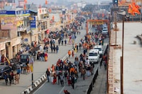 Hindu devotees walk towards the Hindu god Lord Ram temple after its inauguration in Ayodhya, India, January 23, 2024. REUTERS/Adnan Abidi