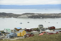 Small boats make their way through the Frobisher Bay inlet in Iqaluit on Friday, Aug. 2, 2019. Nunavut filmmakers and videographers say construction of a large-scale TV and film production studio in Iqaluit will be 'game changing' for the territory's film industry. THE CANADIAN PRESS/Sean Kilpatrick