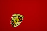 FILE PHOTO: The Porsche logo is displayed at the 39 Thailand International Motor Expo, in Bangkok, Thailand, November 30, 2022. REUTERS/Athit Perawongmetha