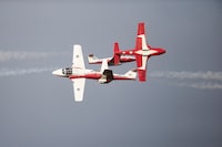 The Canadian Forces Snowbirds perform at Airshow London's Skydrive, a drive-in airshow in London, Ont., Friday, Aug. 27, 2021. Snowbirds pilot Maj. Steve Hurlburt has been charged with sexual assault after an alleged incident in Barrie, Ont., last week. THE CANADIAN PRESS/Geoff Robins