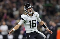 NEW ORLEANS, LOUISIANA - OCTOBER 19: Trevor Lawrence #16 of the Jacksonville Jaguars celebrates after throwing a 44-yard touchdown pass to Christian Kirk #13 (not pictured) during the fourth quarter against the New Orleans Saints at Caesars Superdome on October 19, 2023 in New Orleans, Louisiana. (Photo by Jonathan Bachman/Getty Images)