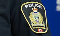 A Winnipeg Police Service shoulder badge is seen at a press conference in Winnipeg on Sept. 2, 2021. THE CANADIAN PRESS/David Lipnowski