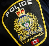 <p>Police in Winnipeg have made an arrest in a string of grocery store robberies where they allege the suspect stole large quantities of meat. A Winnipeg Police Service shoulder badge is shown in Winnipeg on November 5, 2019.THE CANADIAN PRESS/John Woods</p>