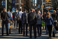Toronto, Ontario - June 28, 2017 -- POPULATION --  People walk during rush hour Bay Street in the financial district in Toronto, Wednesday June 28, 2017.   (Mark Blinch/Globe and Mail) 