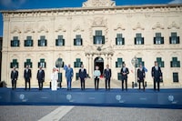 Participants into the Malta Mediterranean Summit pose for a family photo at Castille Square in Valletta, Malta, Friday, Sept. 29, 2023. The leaders of nine southern European Union countries met in Malta on Friday, Sept. 29, 2023, to discuss common challenges such as migration, the EU's management of which has vexed national governments in Europe for years. (AP Photo/Rene Rossignaud)