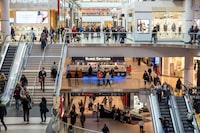 FILE PHOTO: People shop at the Eaton Centre in Toronto, Ontario, Canada November 22, 2022.  REUTERS/Carlos Osorio/File Photo