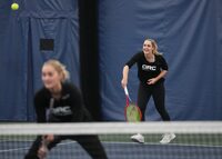 Gabriela Dabrowski, right, and her partner Erin Routliffe take part in a tennis clinic at the Ontario Racquet Club in Mississauga, Ont., on Friday, Dec. 8, 2023. Dabrowski felt a connection "right away" when she started playing doubles with fellow Canadian Routliffe last season.THE CANADIAN PRESS/Nathan Denette