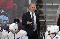 Tampa Bay Lightning head coach Jon Cooper calls out to players during the third period of Game 2 of the first-round of an NHL Stanley Cup Playoff series against the Florida Panthers, Tuesday, April 23, 2024, in Sunrise, Fla. (AP Photo/Wilfredo Lee)