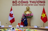Trade Minister Mary Ng embraces Vietnamese Trade Minister Nguyễn Hồng Diên during trade talks with the government of Vietnam in Hanoi, Vietnam on March 27, 2024. James Griffiths/The Globe and Mail