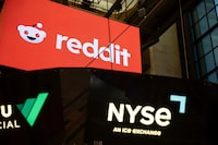 Reddit Inc. signage is seen on the New York Stock Exchange trading floor prior to Reddit IPO, March. 21, 2024.