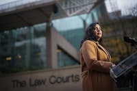 The British Columbia government has introduced proposed legislation to recover health-related costs from alleged "wrongdoers," including social-media giants. B.C. Attorney General Niki Sharma pauses while responding to questions outside B.C. Supreme Court in Vancouver, B.C., Monday, Nov. 27, 2023. THE CANADIAN PRESS/Darryl Dyck