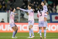 Japan's players celebrate after Hinata Miyazawa scored their third goal during the Women's World Cup second round soccer match between Japan and Norway in Wellington, New Zealand, Saturday, Aug. 5, 2023. (AP Photo/Alessandra Tarantino)