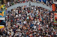 Crowds attend Family Day at the Calgary Stampede in Calgary, Sunday, July 9, 2023. THE CANADIAN PRESS/Jeff McIntosh