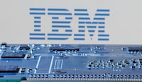 FILE PHOTO: IBM logo is seen near computer motherboard in this illustration taken January 8, 2024. REUTERS/Dado Ruvic/Illustration/File Photo