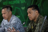 FILE PHOTO: Armed Forces of the Philippines Chief of Staff General Romeo Brawner Jr. speaks to the media beside Western Command chief Vice Admiral Alberto Carlos during a press briefing at Western Command in Puerto Princesa, Palawan, Philippines, August 10, 2023. REUTERS/Eloisa Lopez/File Photo
