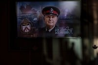 The face of Toronto Police officer Jeffrey Northrup is seen on a plasma screen at his his funeral service, in Toronto on July 12, 2021. Jury selection is expected to begin today in the trial of a man accused of killing a Toronto police officer nearly three years ago. Umar Zameer is charged with first-degree murder in the the death of Const. Jeffrey Northrup. THE CANADIAN PRESS/Chris Young