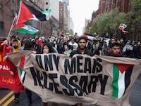 Demonstrators protest in solidarity with Pro-Palestinian organizers as they block a street, amid the ongoing conflict between Israel and the Palestinian Islamist group Hamas, in New York City, U.S., April 18, 2024. REUTERS/Caitlin Ochs