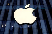 FILE PHOTO: The Apple Inc. logo is seen hanging at the entrance to the Apple store on 5th Avenue in Manhattan, New York, U.S., October 16, 2019. REUTERS/Mike Segar