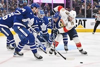 May 12, 2023; Toronto, Ontario, CAN;  Florida Panthers forward Matthew Tkachuk (19) battles for a loose puck with Toronto Maple Leafs forward Auston Matthews (34) and defenseman Jake McCabe (22) in front of goalie Joseph Woll (60) in the second period in game five of the second round of the 2023 Stanley Cup Playoffs at Scotiabank Arena. Mandatory Credit: Dan Hamilton-USA TODAY Sports