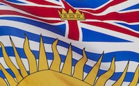 British Columbia's provincial flag flies in Ottawa, Friday July 3, 2020. Electricity has been restored to nearly 4,000 homes and businesses in Kamloops, B.C., after a rapidly spreading grass fire swept through an area not far from the city centre. THE CANADIAN PRESS/Adrian Wyld