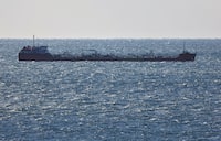 A crude oil tanker sails in Nakhodka Bay near the port city of Nakhodka, Russia, December 4, 2022. REUTERS/Tatiana Meel/File Photo