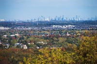 The condos and office towers in the city of Mississauga are seen in the distance with the town of Milton, Ont. in the foreground, as photographed from Steeles Ave. West, near the Niagara Escarpment. Oct 15 2019