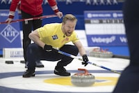 Swedens's Skip Niklas Edin in action during the final game against Canada at the Men's World Curling Championship, at the IWC Arena in Schaffhausen, Switzerland, Sunday, April 7, 2024. (Christian Beutler/Keystone via AP)