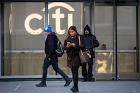 FILE PHOTO: Workers exit the Citi Headquarters in New York, U.S., January 22, 2024.  REUTERS/Brendan McDermid/File Photo