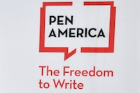 FILE - A logo is displayed at the PEN America Literary Awards, March 2, 2023, in New York. Facing widespread unhappiness over its response to the Israel-Hamas war, the writers’ group PEN America on Monday, April 22, 2024, called off its annual awards ceremony. (Photo by Evan Agostini/Invision/AP, File)