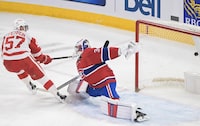 Detroit Red Wings' David Perron scores against Montreal Canadiens goaltender Cayden Primeau during first period NHL hockey action in Montreal, Tuesday, April 4, 2023. THE CANADIAN PRESS/Graham Hughes