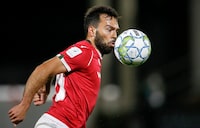 Cavalry FC's Sergio Camargo traps the ball during first half soccer action against Pacific FC in the Canadian Championship quarter-final in Calgary on Wednesday, Sept. 22, 2021. Camargo, one of 10 original signings for the Canadian Premier League in November 2018, looks to celebrate his 100th appearance for Cavalry FC on Saturday when the Calgary team kicks off its sixth season at Forge FC in a rematch of last year's championship game. THE CANADIAN PRESS/Jeff McIntosh