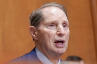 Sen. Ron Wyden, D-Ore., talks during a Senate Finance Committee business meeting to consider the nomination of Martin O'Malley, of Maryland, to be Commissioner of Social Security on Capitol Hill, Tuesday, Nov. 28, 2023, in Washington. (AP Photo/Mariam Zuhaib)