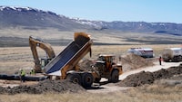 Construction continues at the Lithium Nevada Corp. mine site Tracker Pass project on April 24, 2023, near Orovada, Nev. The Biden administration says the project will help mitigate climate change by speeding the shift from fossil fuels. But opponents say it is not worth the costs to the local environment and people. (AP Photo/Rick Bowmer)