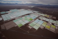 An aerial view shows the brine pools of SQM lithium mine on the Atacama salt flat in the Atacama desert of northern Chile, January 10, 2013.